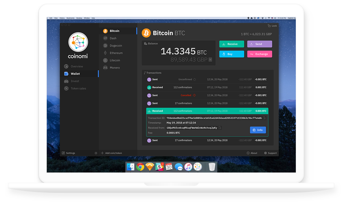 Computer with screenshot of Coinomi desktop